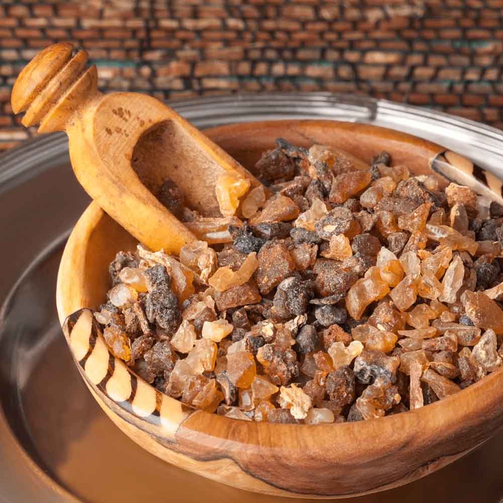 Bowl of Myrrh raw material used to make bulk organic Myrrh essential oils by Sri Venkatesh Aromas. 