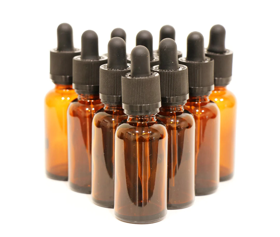 Multiple amber glass bottles with dropper